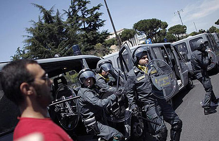 Demonstrators protest in Rome ahead of G8 meeting